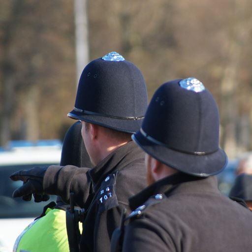 Two police officers in street