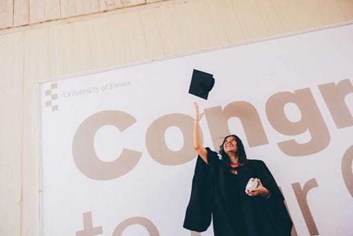 Student throwing graduation cap