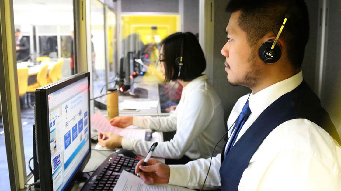 A student in a translation booth