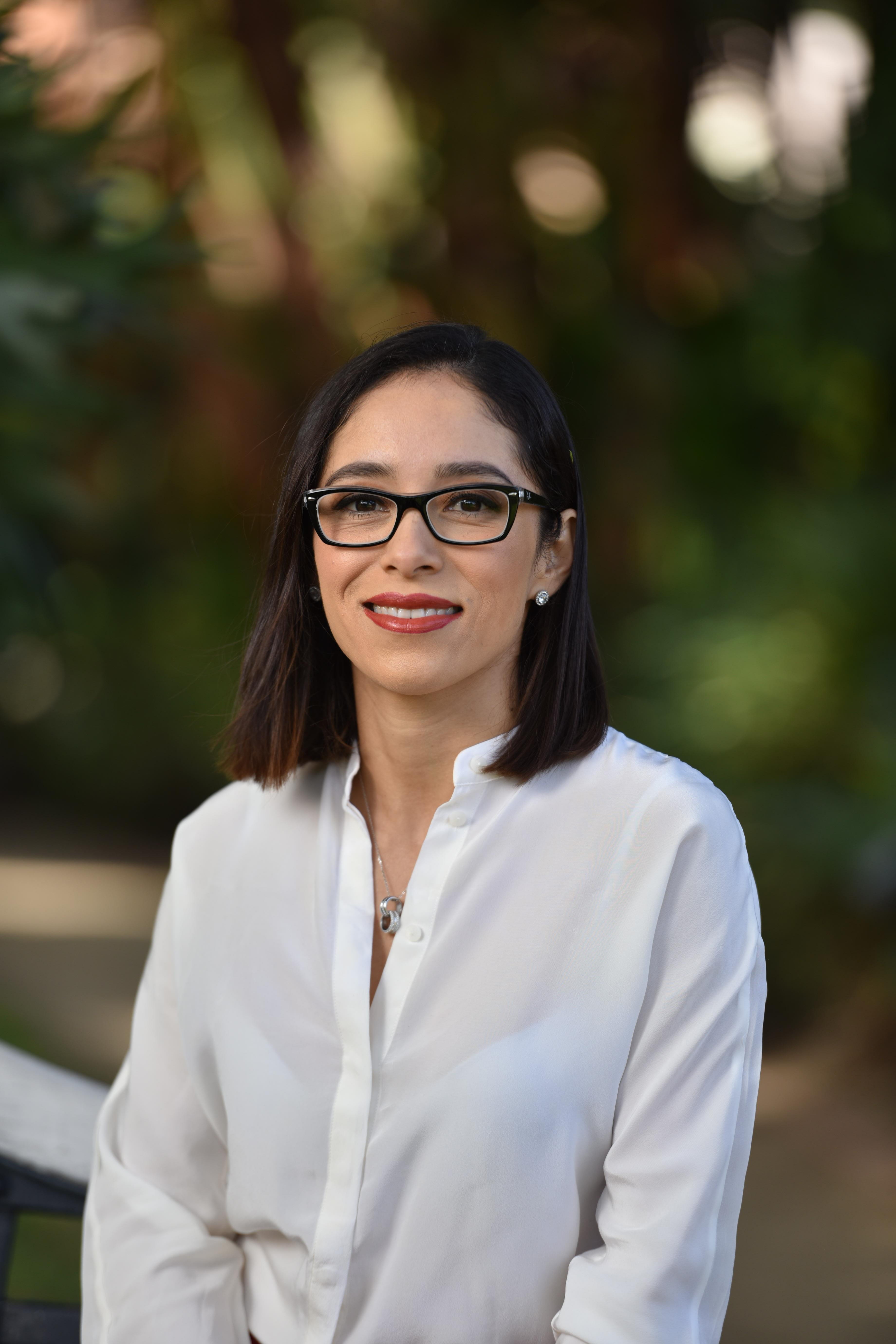 Headshot of Alba Sarmiento