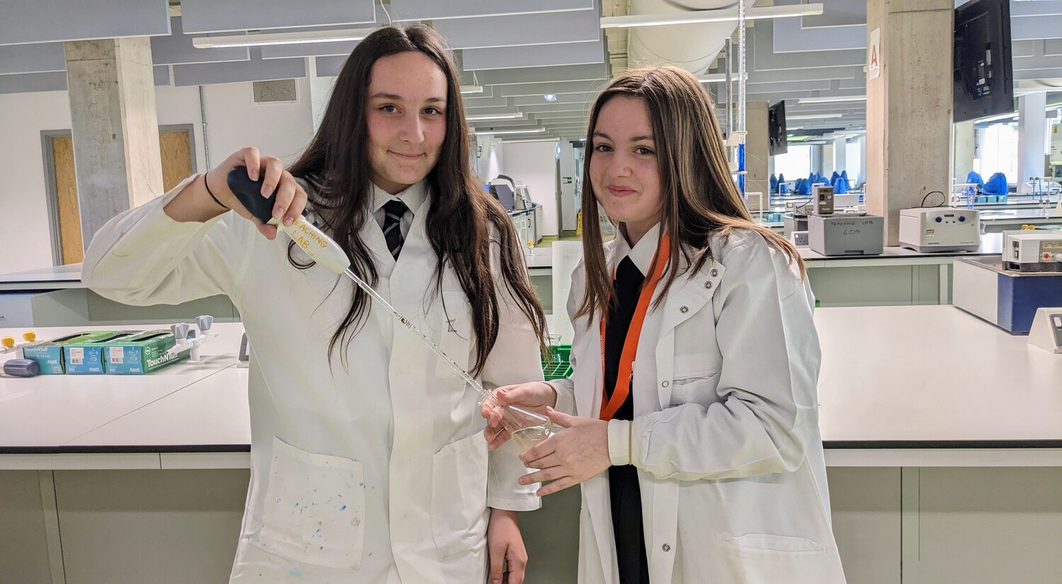 Two students learn about chemistry