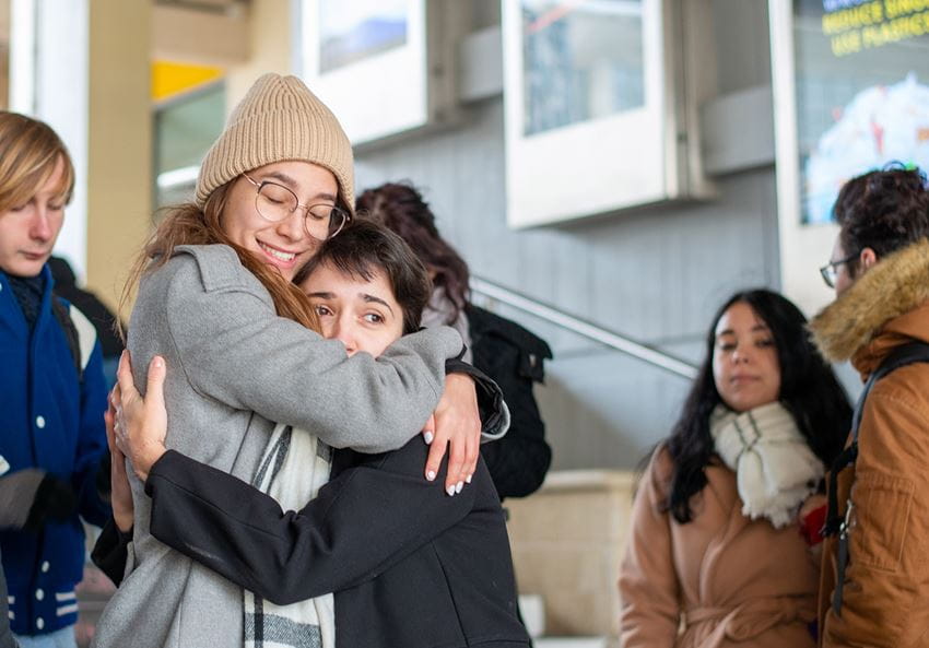 students embracing at colchester campus