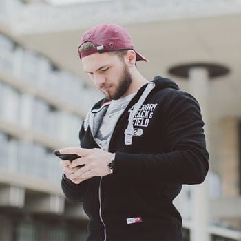 male student on phone
