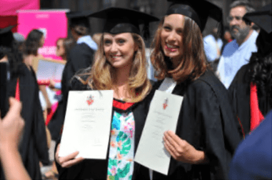 Essex Law Graduates displaying their diplomas