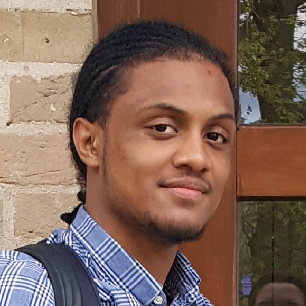 A headshot of Kasey Adu Poku