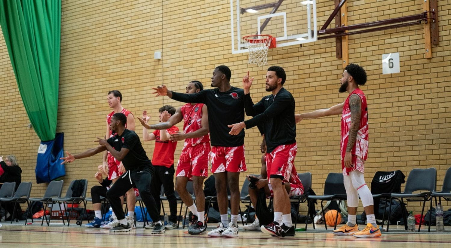 The Blade's basketball team celebrating 