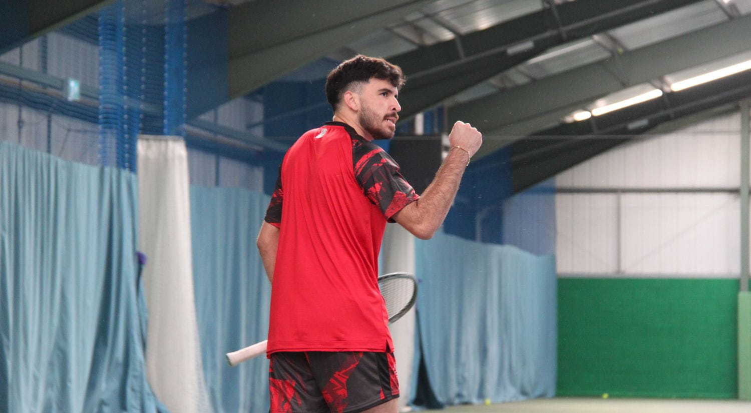 Tennis ace Carlos Corser cheers