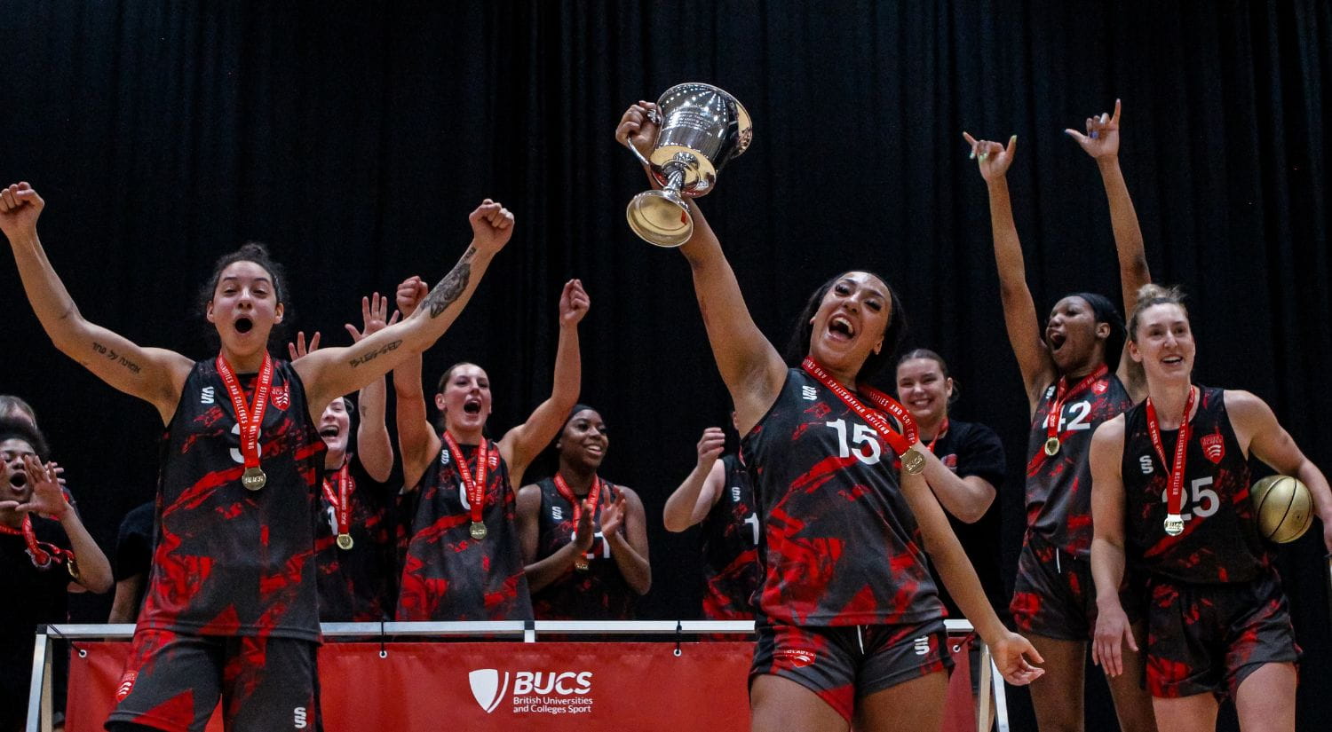The women's basketball team celebrate