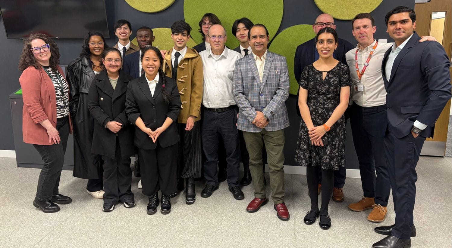Greg Cooper and Paul Walter with students taking part in the iTeams project)