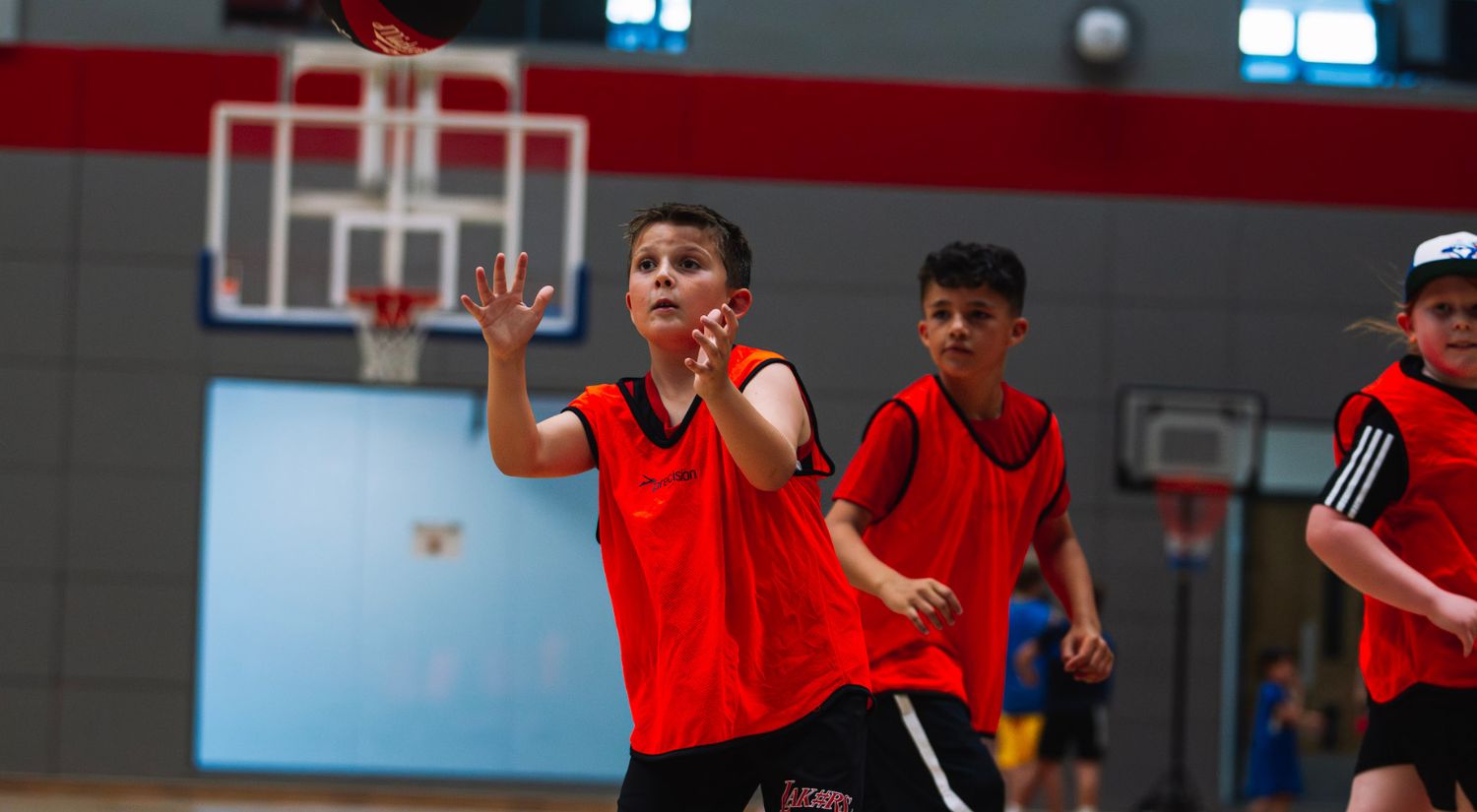 A youngster goes for the ball