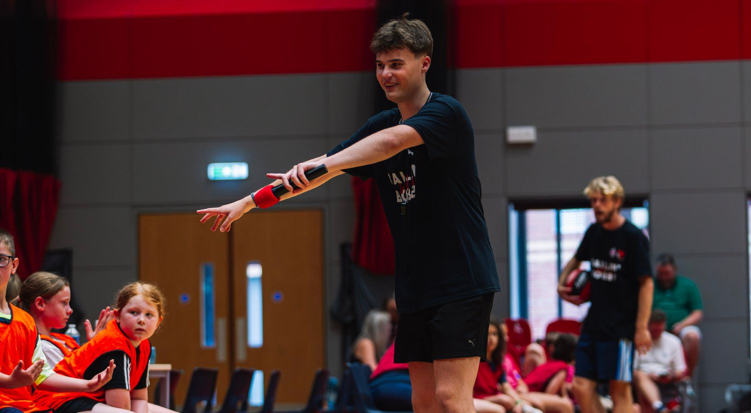 Essex Rebels intern Luca Erzmoneit-Ide warms up the crowd