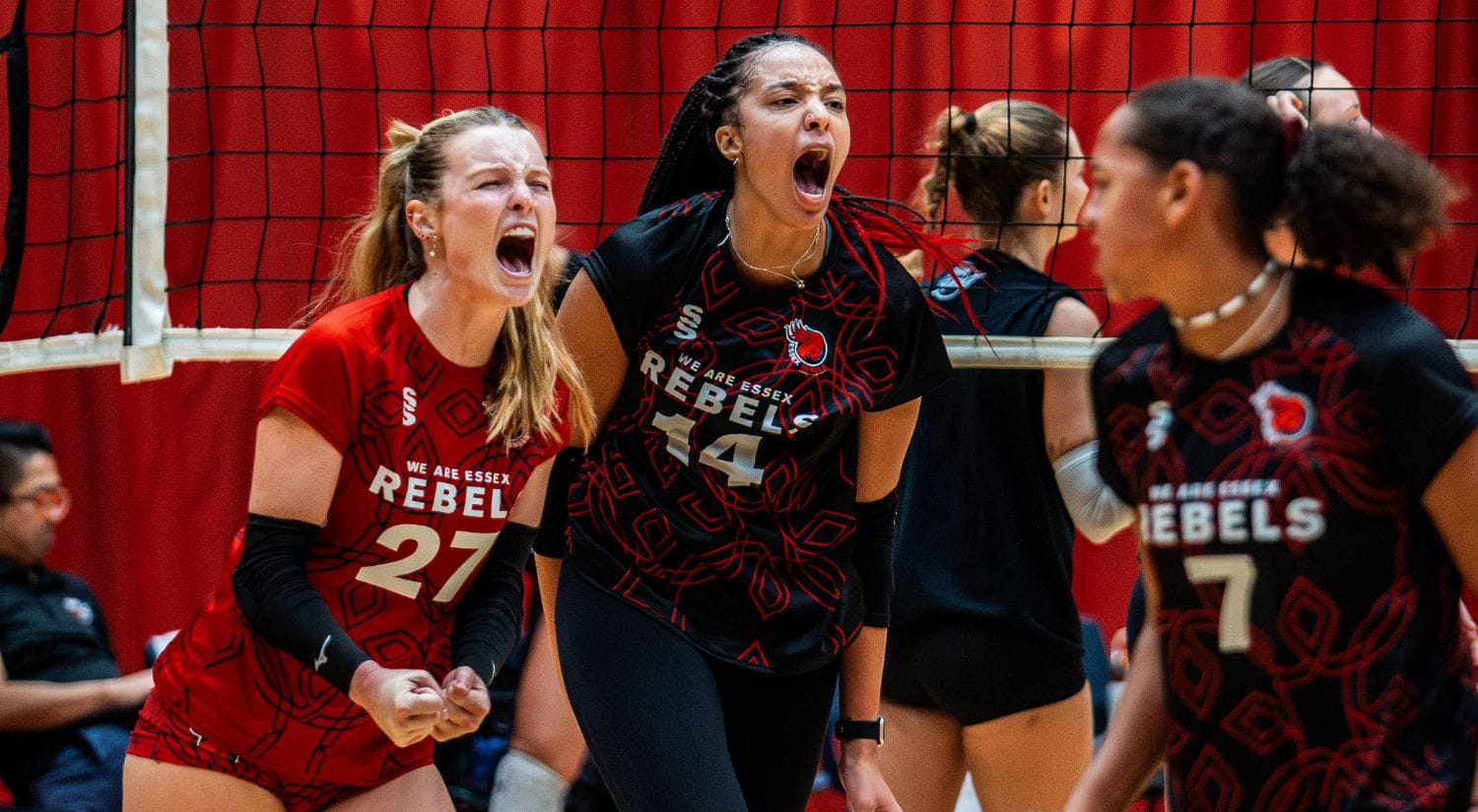 Kathea Schamblin and Eleyna Duprey Roar after scoring a massive point