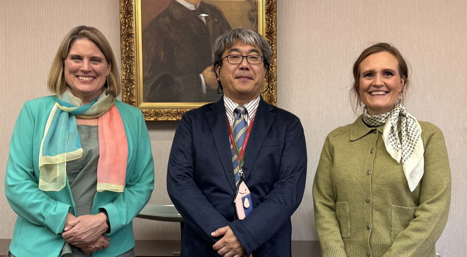 Professor Atsushi Tago with the international partnerships team