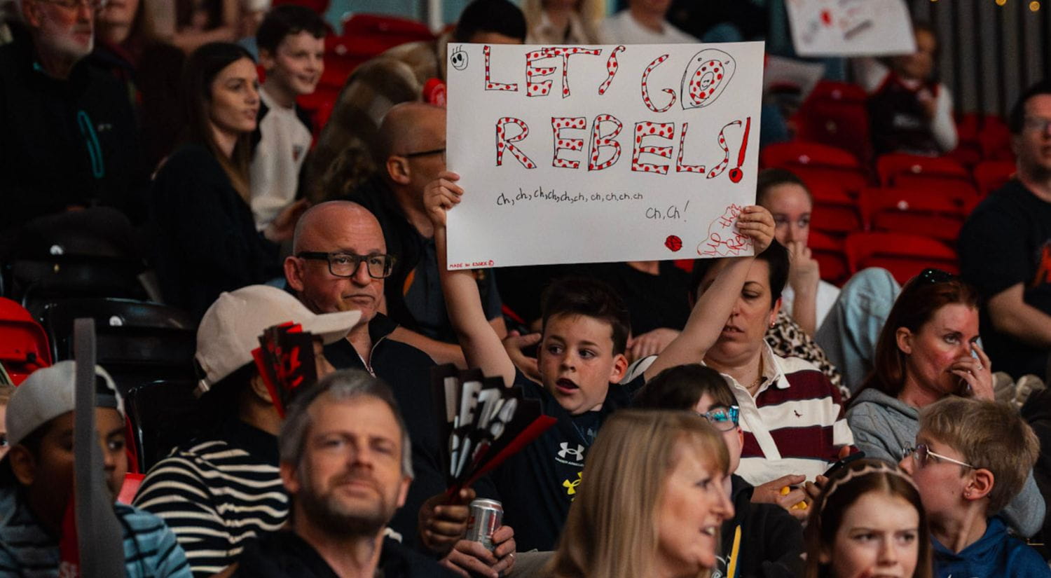 Home made signs peppered the crowd