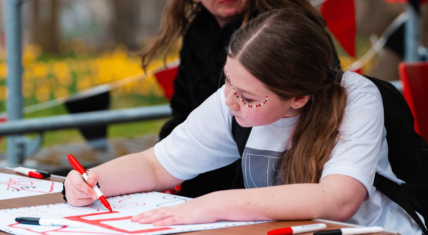 A young girl in the fanzone