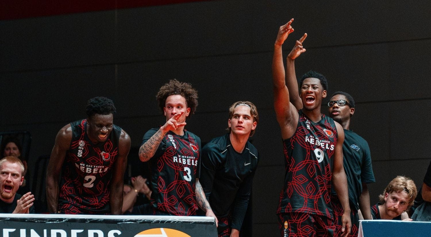 The men's bench celebrating