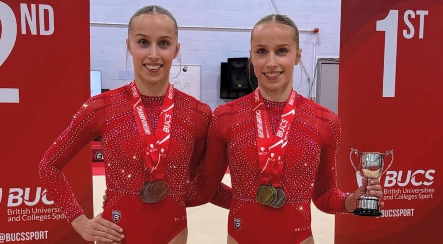 Abigail and Emily Roper on the podium