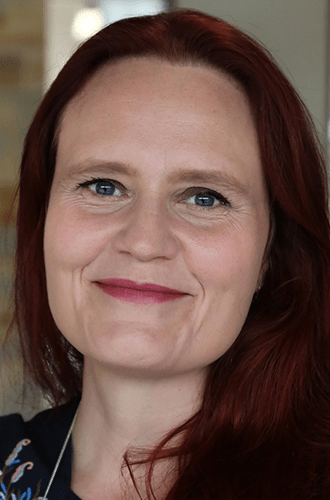 Close up of Annecy smiling for the camera.