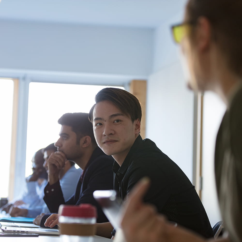 Students sitting at desks in classroom