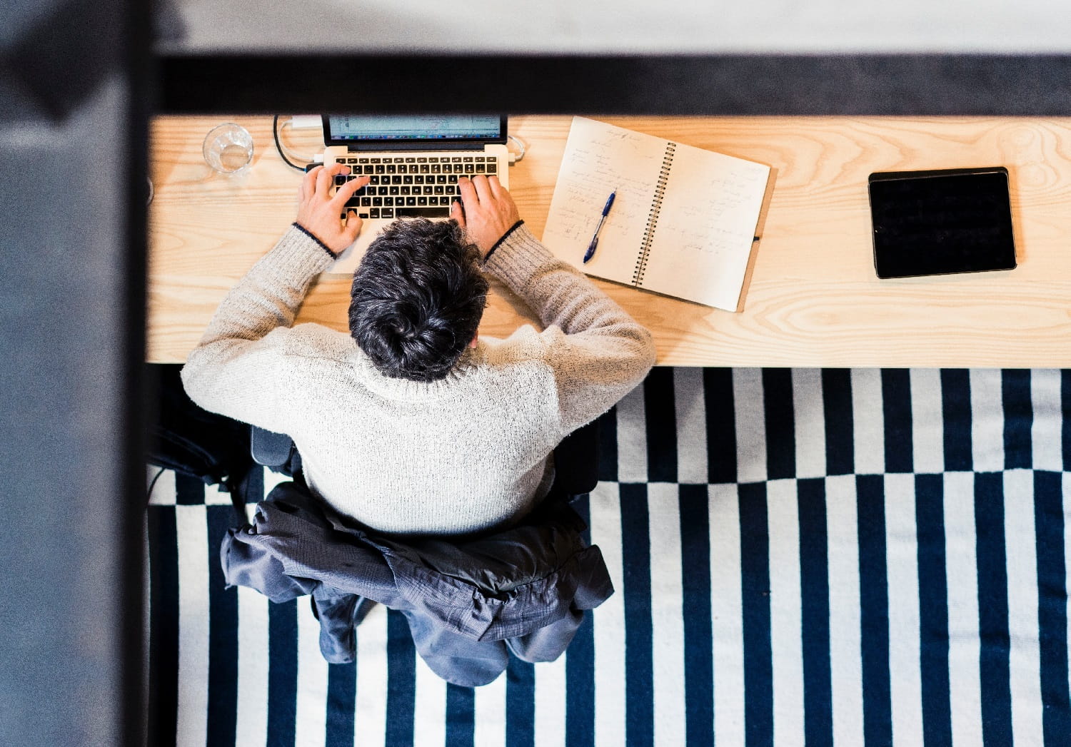 An aerial view of a desk with working from home.