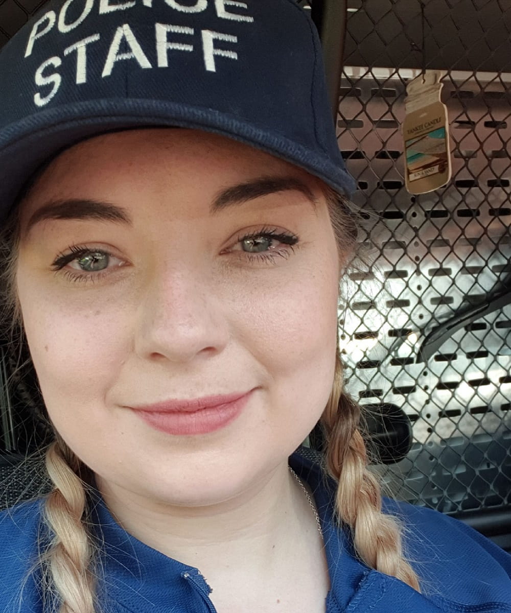 Helena Randall wearing a police staff baseball cap
