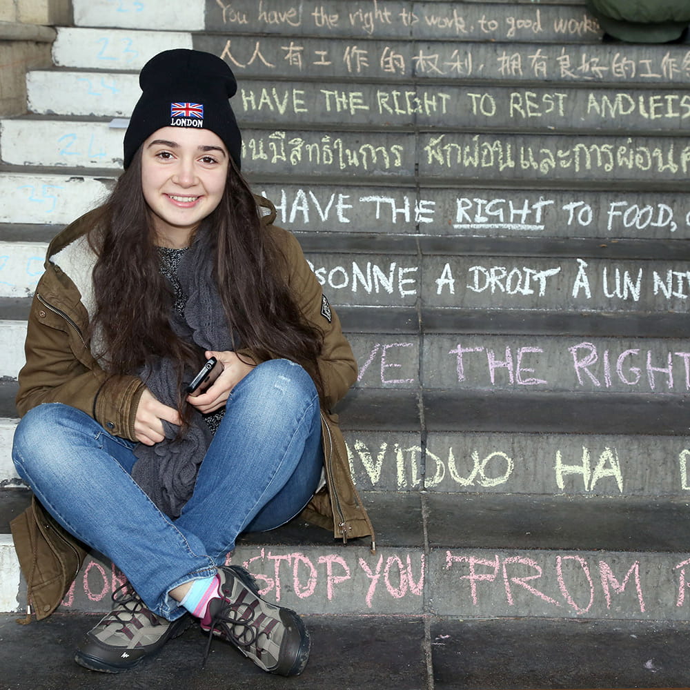 Woman sitting on steps
