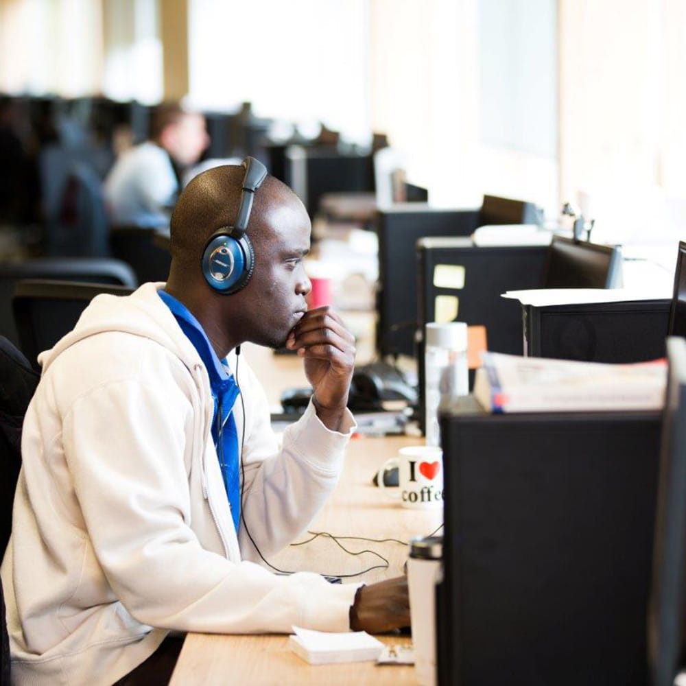 PhD student working at computer