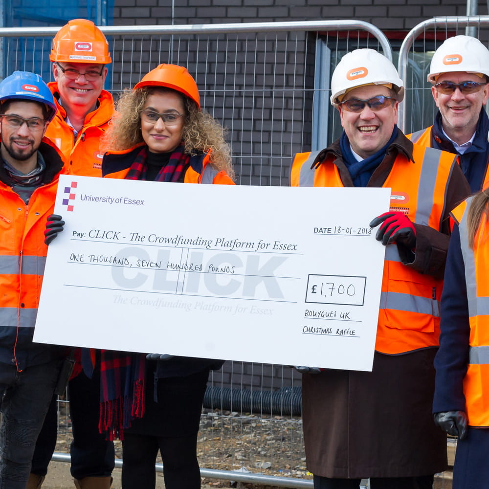 The Bouyges team hand their cheque to the Essex team