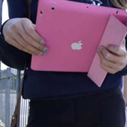 Girl using tablet to check social media