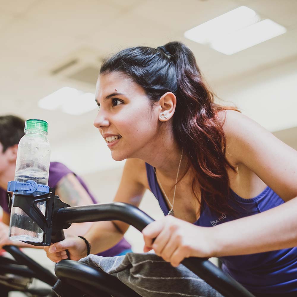A woman on an exercise bike