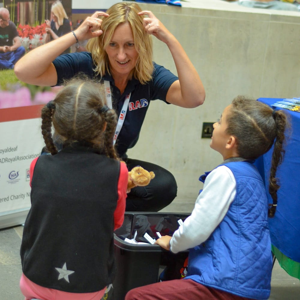 Children learning sign language