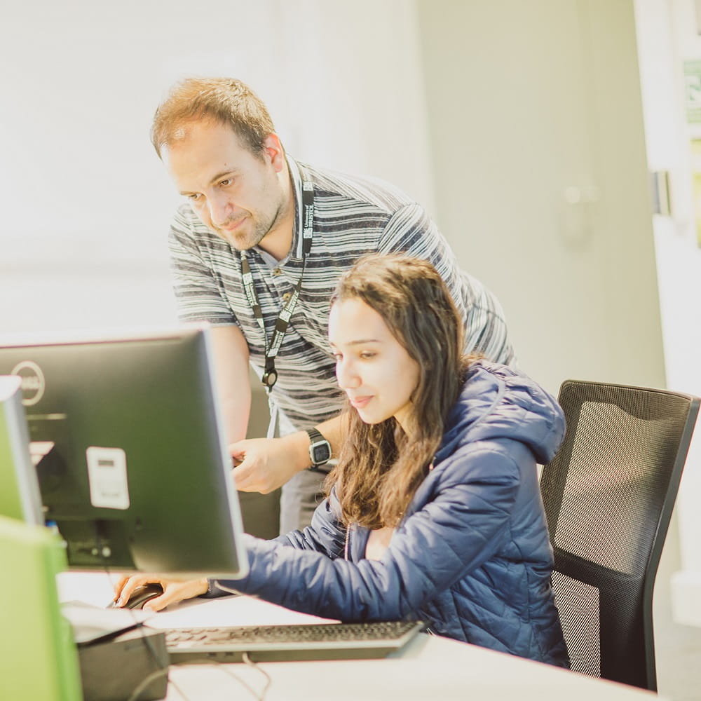 two people at computer