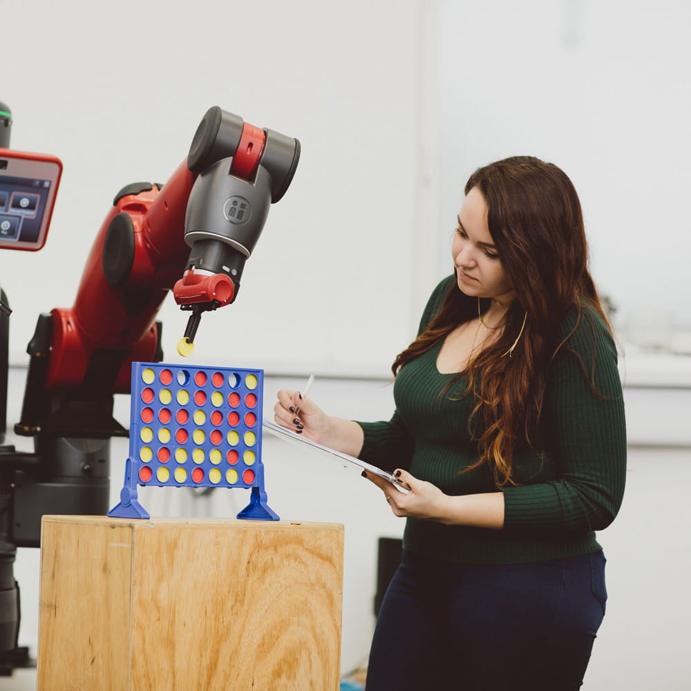 Student in robot arena