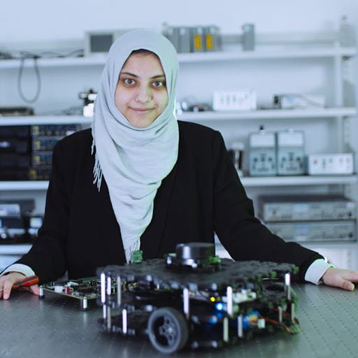 student with robot