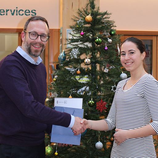 Dean of Essex Business School presents a prize to Ivona Tajslova for the best performance in BE610 Introduction to Banking.