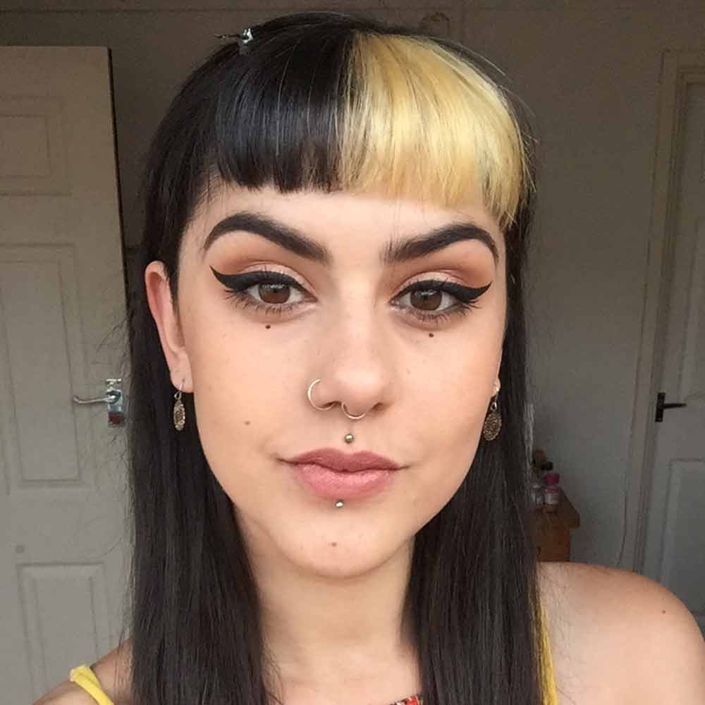 Natalia Kheldouni, with long, straight black hair 