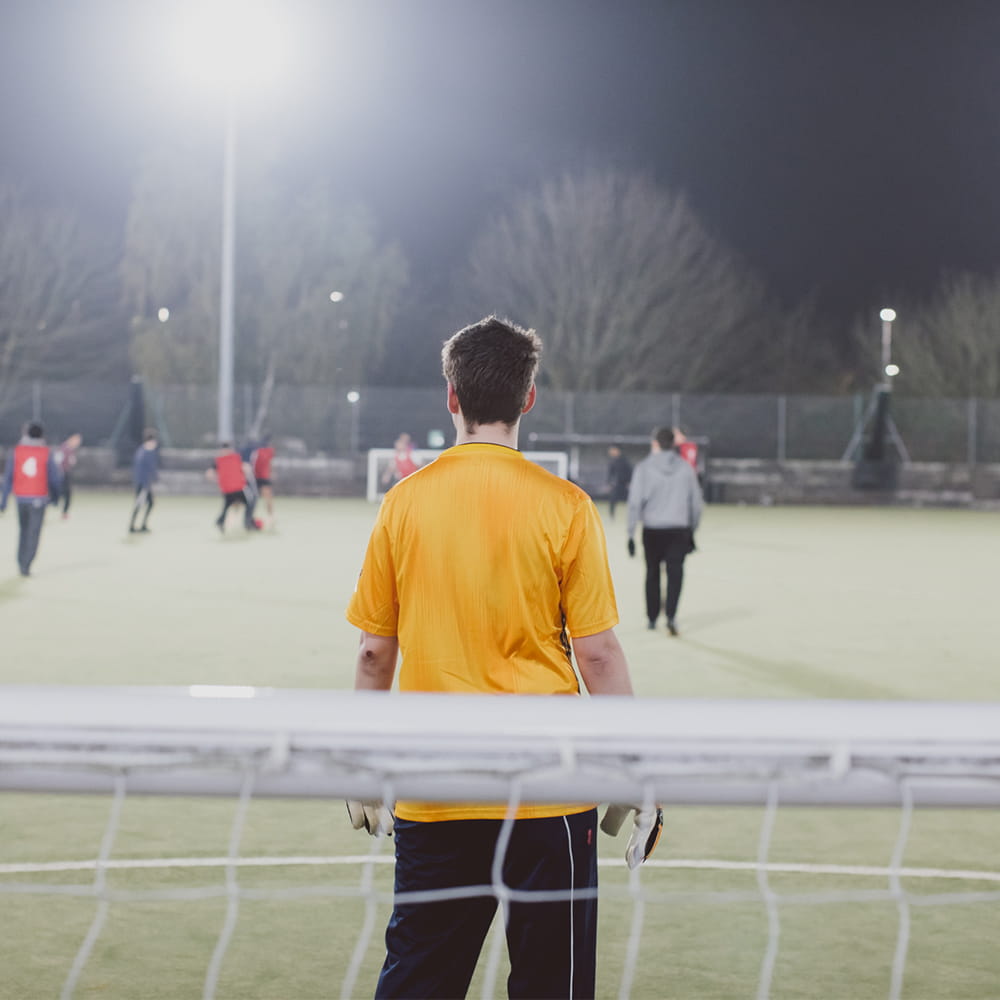 A man plays football