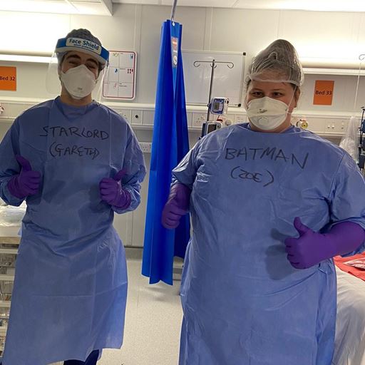 Students Gareth Golber and Zoe Wager in PPE gear