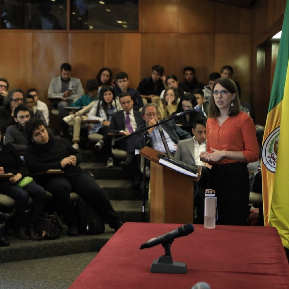 Participants of the GCRF Bogata Workshop sitting  at desks using computers