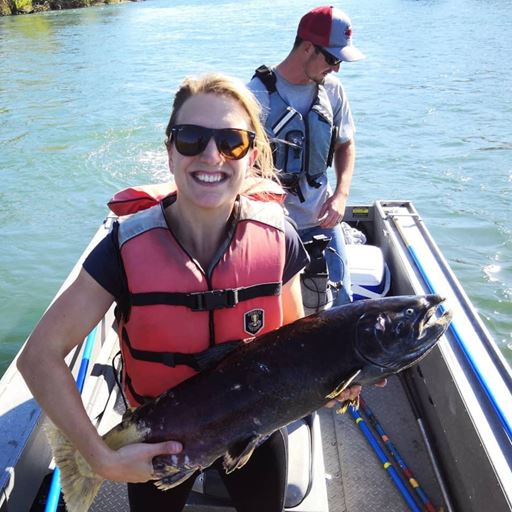 Anna Sturrock holding a salmon