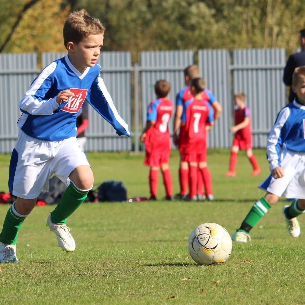 Boy playing football