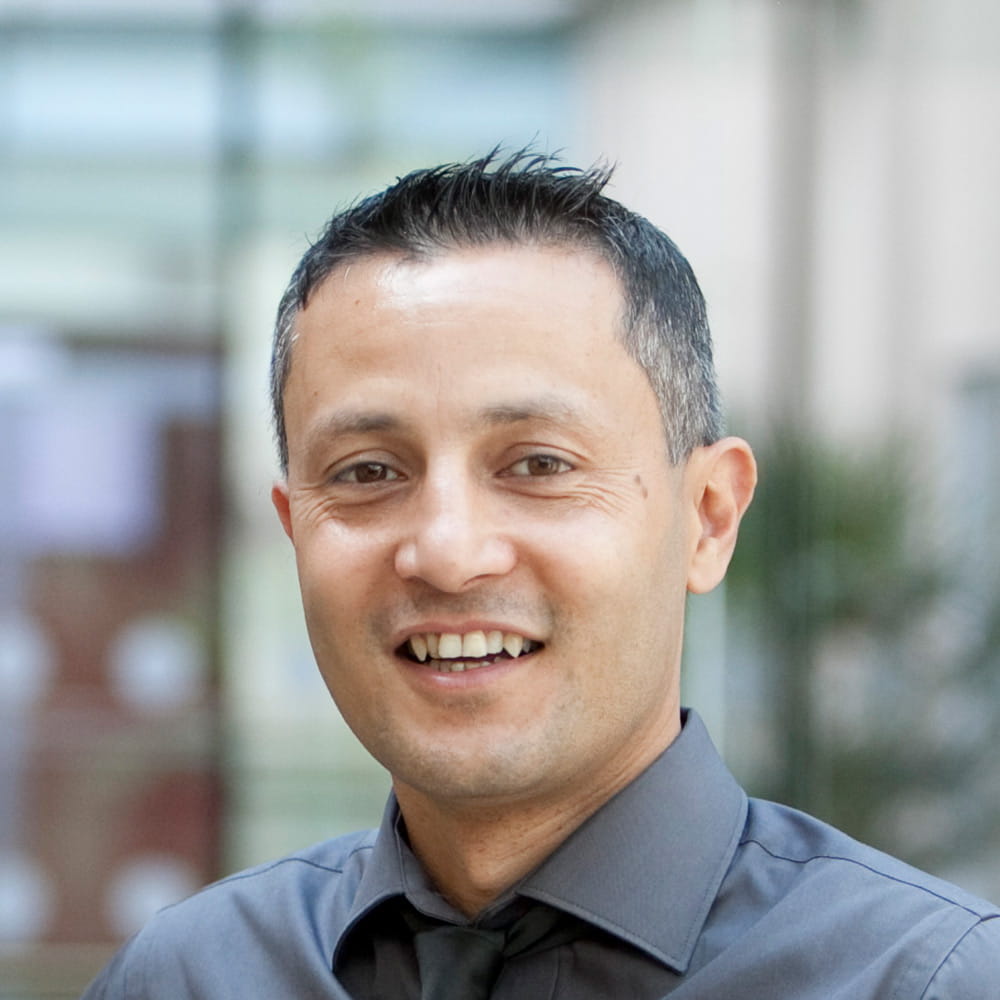 portrait photo of Prof Pawan Adhikari