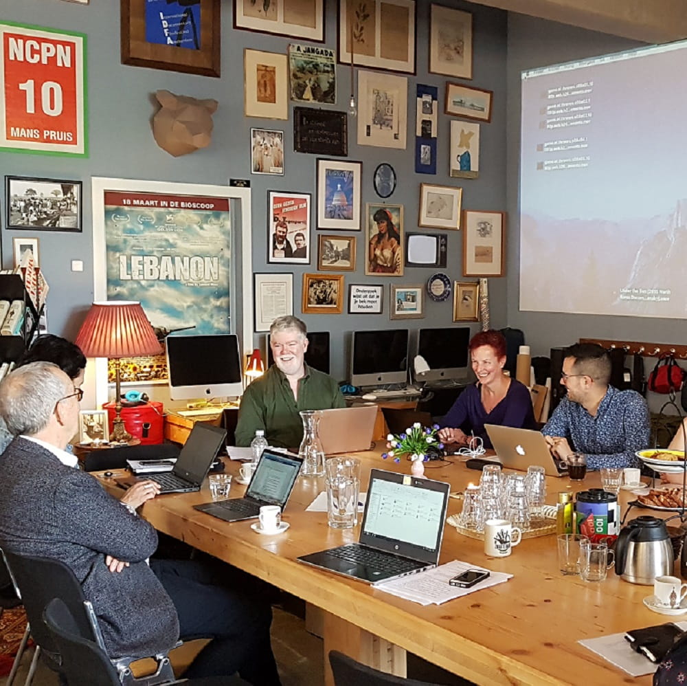 photo of a conference round table discussion