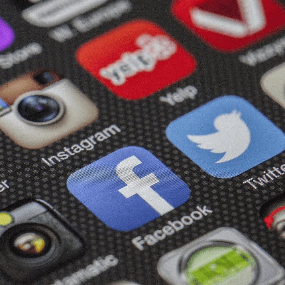 Photo of a phone screen showcasing social media buttons
