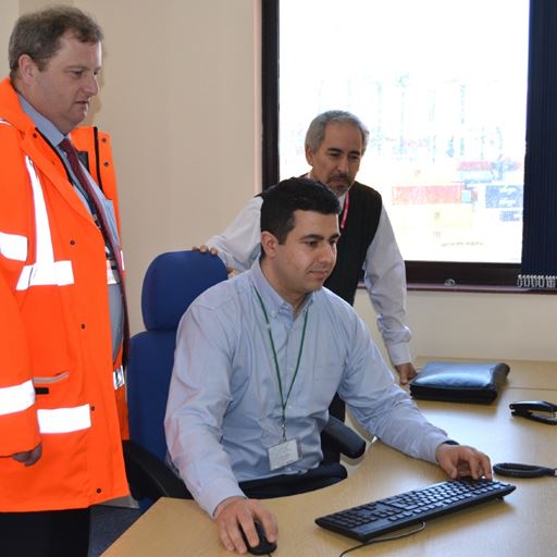 Stephen Abraham, Ali Shaghaghi and Abdel Salhi working at port.
