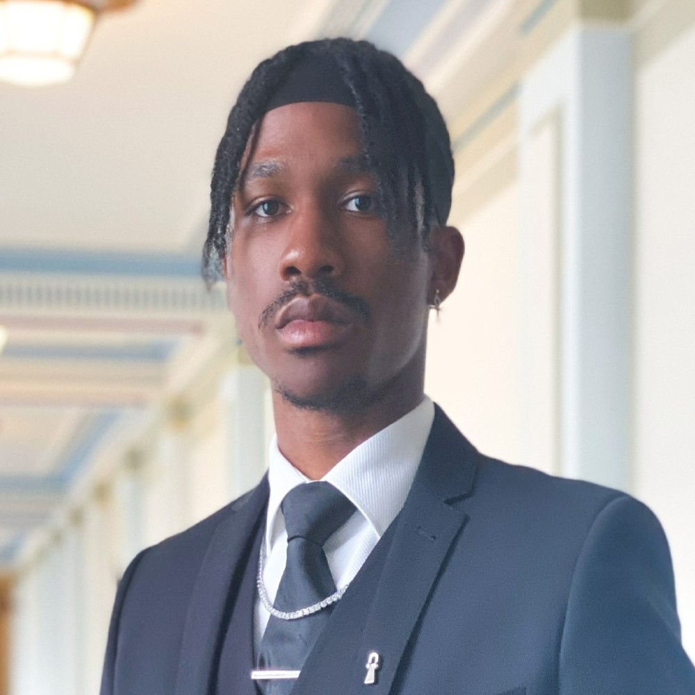 Portrait of law graduate 2021 Malik Mikel