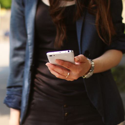 Female holding smartphone