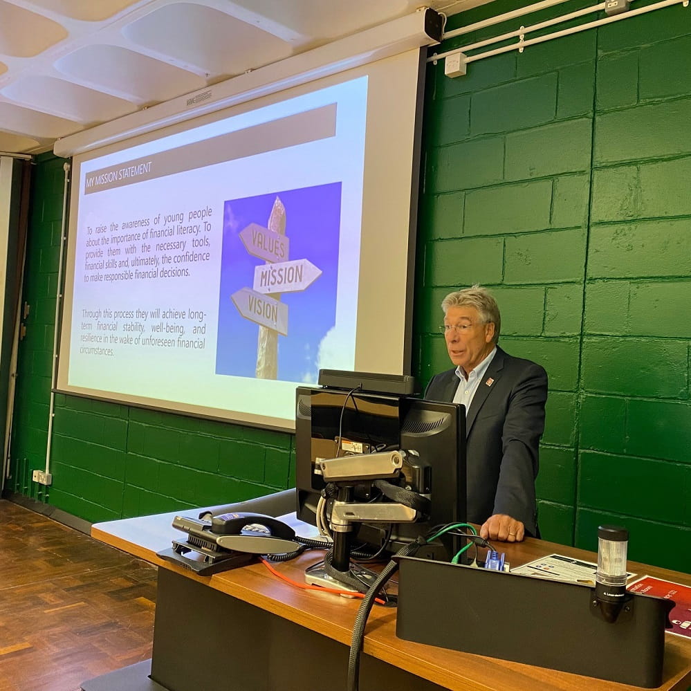 photo of Ian Sinclair Begg giving a presentation 