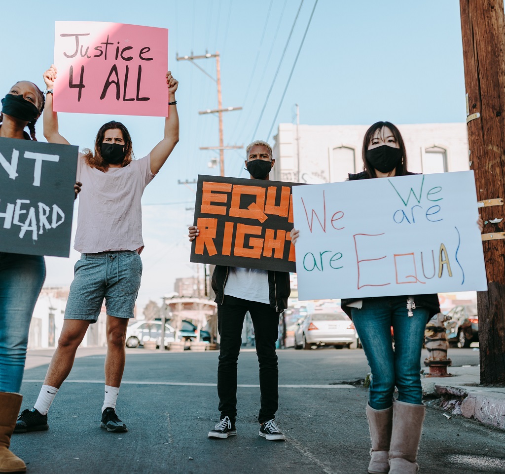 People holding equal rights banners