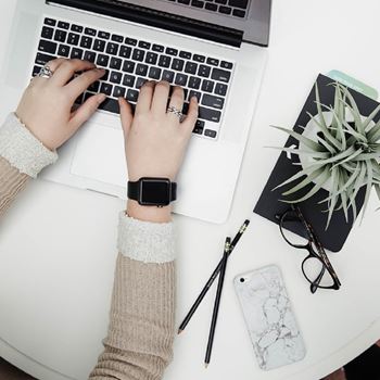 Person typing on laptop